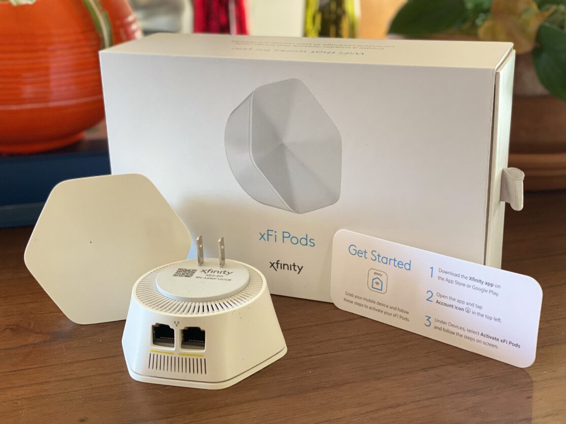 Image of the Xfinity xFi Pod and its packaging.
