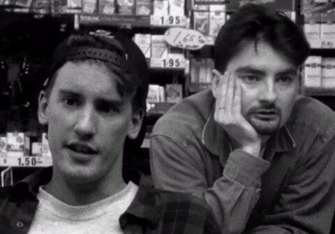 Randal (Jeff Anderson) and Dante (Brian Halloran) contemplate their private and professional lives in Clerks