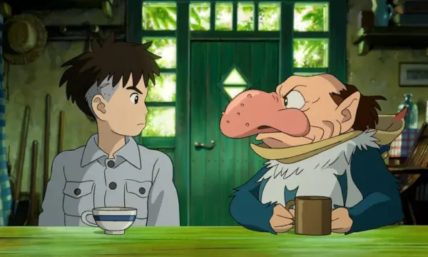 An anime boy with messy black hair scowls at a man with feathers and a large nose.
