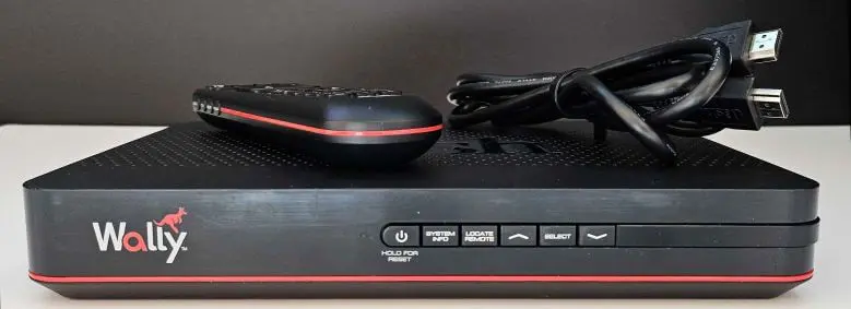 Image of the DISH Wally receiver, with the DISH voice remote and an HDMI cable.