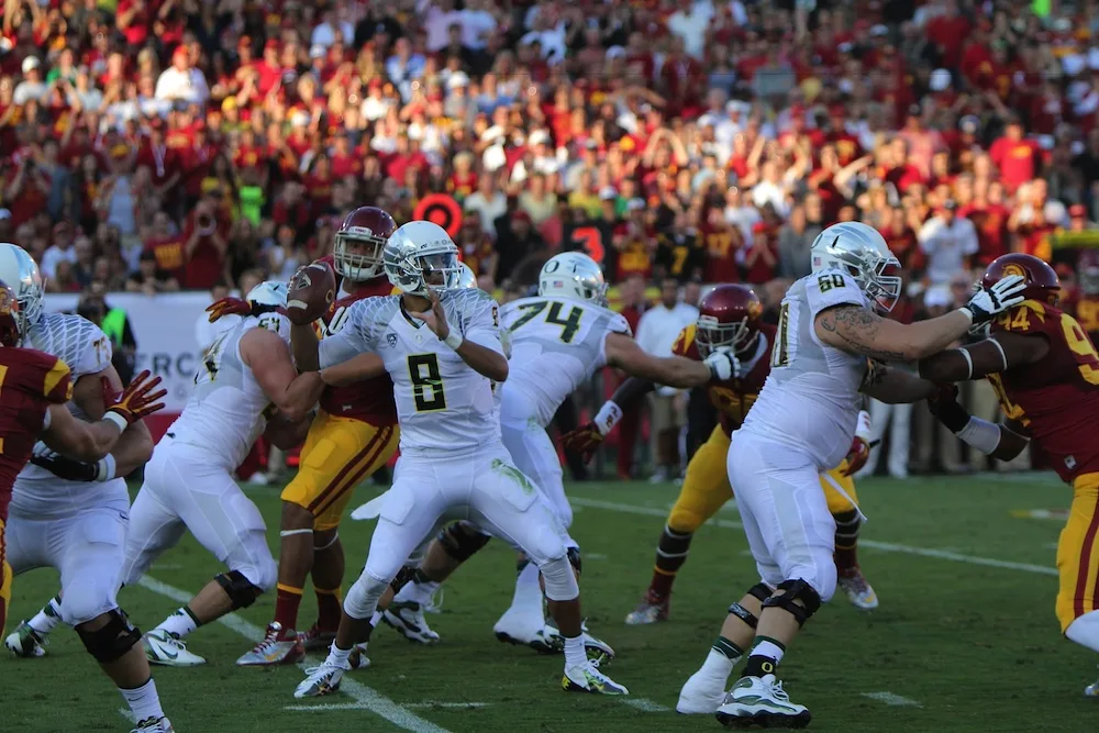 Oregon Ducks Football facing USC Trojans Football in 2012.