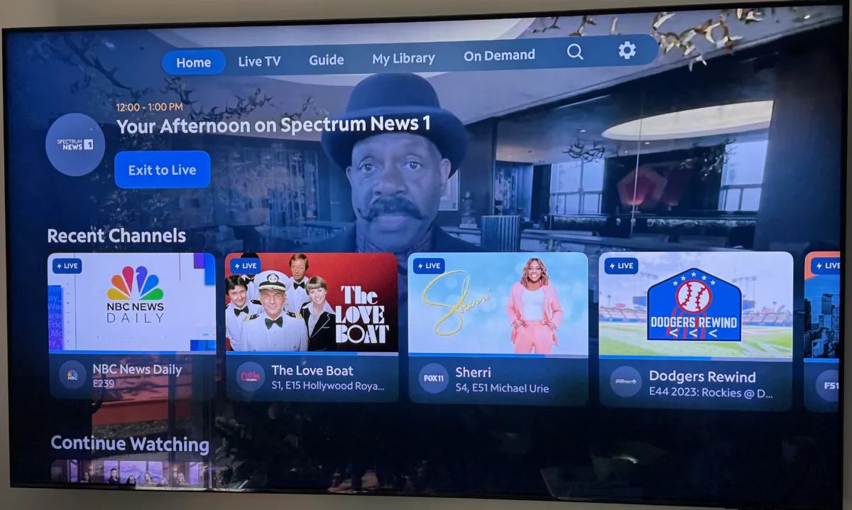 A home TV showing Spectrum cable TV homepage using Apple TV's Spectrum app.